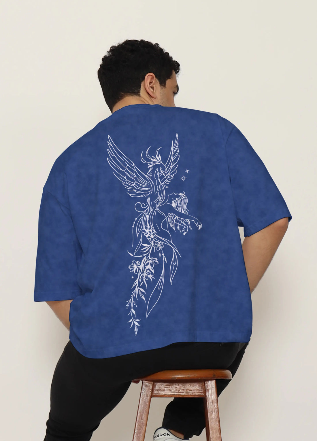 Winged Feminine Figure